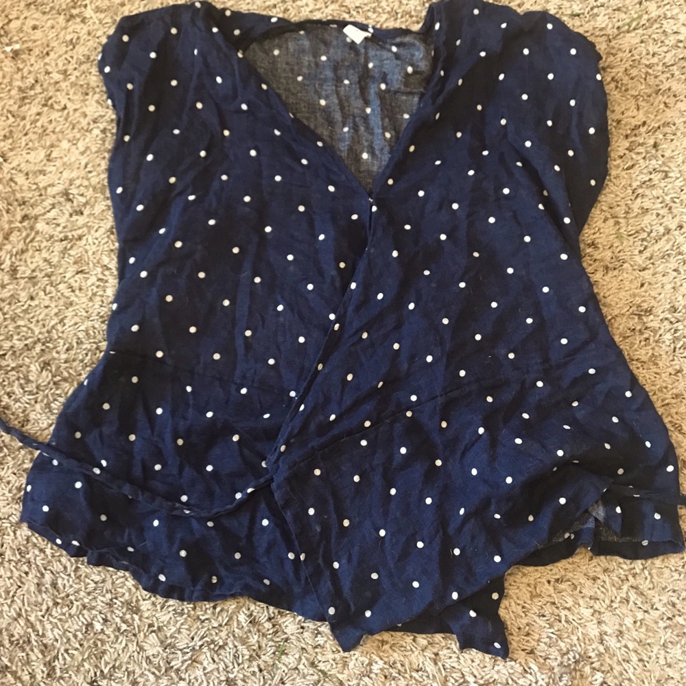 Navy polka dot wrap shirt.